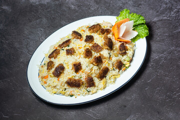 Kofta pulao served in dish isolated on grey background top view of indian and bangladesh food
