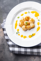 sea scallops fried seafood healthy meal food snack on the table copy space food background rustic top view