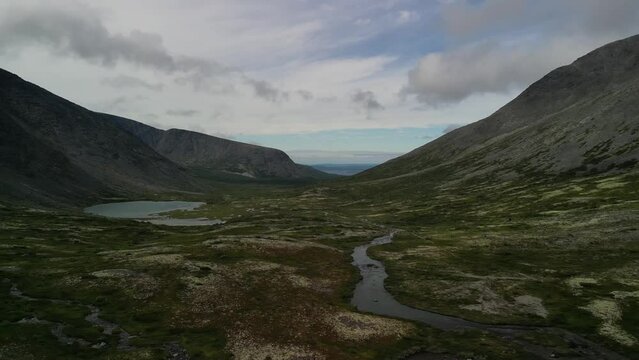 Amazing panoramic view of lakes and rivers in the mountains! The view from the drone. Khibiny