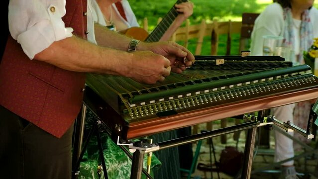 The musician plays the cymbals. Selective focus.