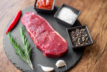 grilled beef steak on wooden background 