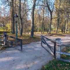 old wooden gate on the path in the park in the Pushkin mountains, Pskov, Russia