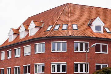 Fototapeta na wymiar Architecture of Cuxhaven city, Germany. European houses with red tiles.
