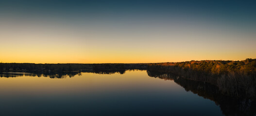 Beautiful aerial view of a lake at sunset, nature. ozark lakes, peachtree city.