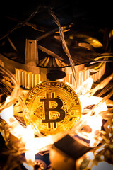 una moneda de bitcoin sobre una placa base y luces 