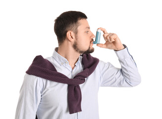 Man with inhaler isolated on white