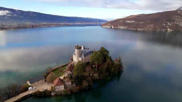 Amazing scenic lakes of European Alps - beautiful Annecy with fairytale castle Duingt. aerial panoramic view. France, haute-Savoie
