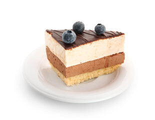 Plate with piece of birds milk cake and  blueberries on white background