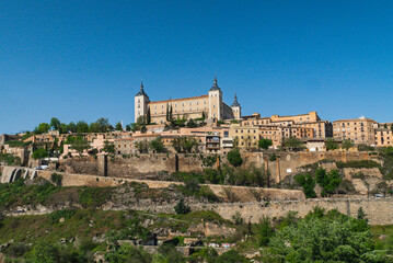 Fototapeta na wymiar Segovia, España. April 29, 2022: Alcazar de Toledo with panoramic landscape in the city and blue sky.