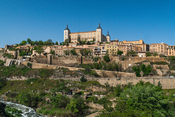 Fototapeta na wymiar Segovia, España. April 29, 2022: Alcazar de Toledo with panoramic landscape in the city and blue sky.