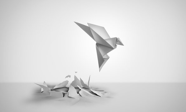 Out Of Nowhere concept of birth or rebirth as an origami bird emerging from a flat paper as a symbol of creativity and metamorphosis as a business success and an icon of change