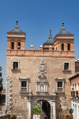 Toledo, España. April 29, 2022: Domes and facade of city churches with blue sky.