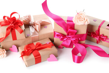 Gift boxes with hearts and roses for Valentine's Day on white background
