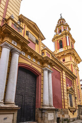 Neoclassical style church of San Ildefonso (Iglesia de San Ildefonso) with two graceful baroque towers was constructed in the 18th century. Seville, Andalusia, Spain.