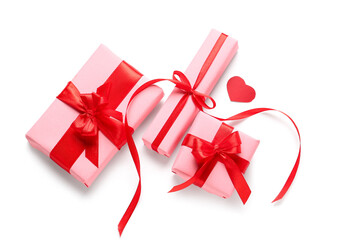 Gift boxes and sequins on white background. Valentine's Day celebration