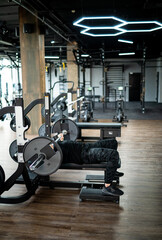 Fototapeta na wymiar Modern empty gym interior. Fitness training sport club.