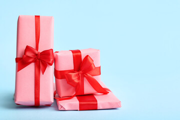 Different gifts for Valentine's Day celebration on color background