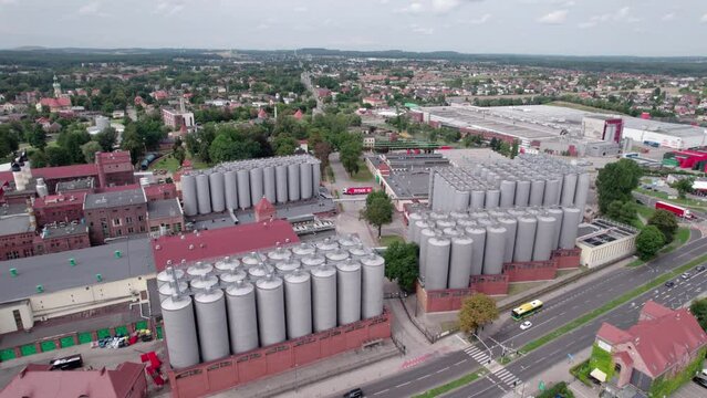Brewery factory in Tychy, Poland from an aerial view on a beautiful sunny day. A giant beer brewing industry located in the Silesian Voivodeship.