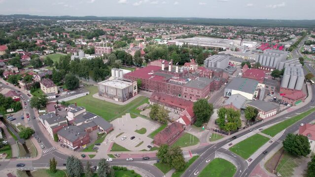 Brewery factory in Tychy, Poland from an aerial view on a beautiful sunny day. A giant beer brewing industry located in the Silesian Voivodeship.
