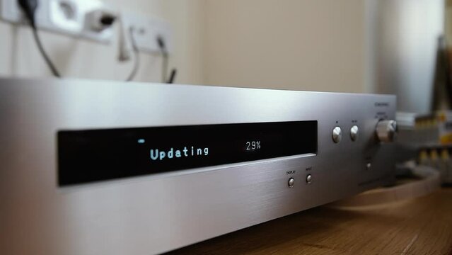 Now updating dot matrix display message on new HI-FI network audio player with Hi-Res Audio during first setup wi-fi message firmware percentage 
