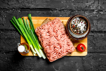Raw minced meat with green onions and spices.