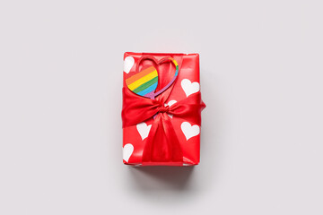 Gift for Valentine's Day on grey background. LGBT concept