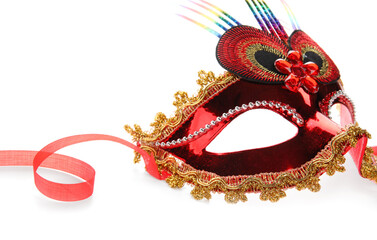Red carnival mask for Mardi Gras celebration on white background, closeup