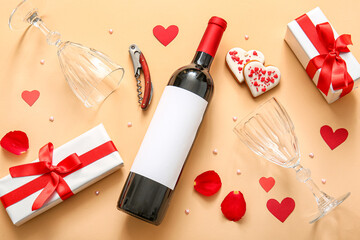 Obraz na płótnie Canvas Composition with bottle of wine, glasses, gifts and cookies on color background. Valentines Day celebration