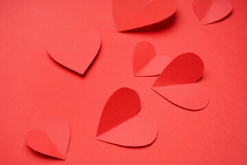 Beautiful paper hearts on red background. Valentines Day celebration