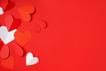 Beautiful paper hearts on red background. Valentines Day celebration