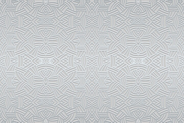 Embossed silver luxury background, ethnic cover design. Press paper, boho style. Geometric actual 3d pattern. Tribal ornamental motifs of the East, Asia, India, Mexico, Aztecs, Peru.