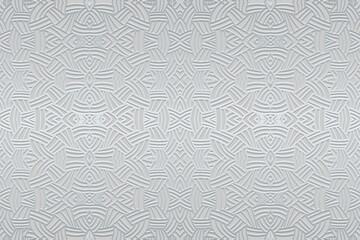 Fototapeta premium Embossed silver luxury background, ethnic cover design. Press paper, boho style. Geometric actual 3d pattern. Tribal ornamental motifs of the East, Asia, India, Mexico, Aztecs, Peru.