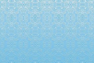 Embossed light blue background, ethnic cover design. Press paper, boho style. Geometric actual art 3d pattern. Tribal ornamental motifs of the East, Asia, India, Mexico, Aztecs, Peru.