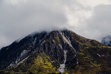 Aerial Drone View of Massive Mountain, Misty On Top in New Zealand