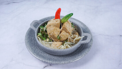 Bakso or Meatball in wok pan. Popular Indonesian street food