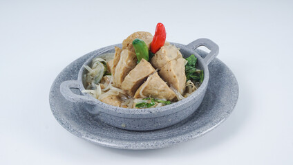 Bakso or Meatball in wok pan. Popular Indonesian street food