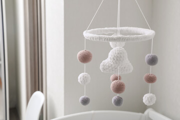 Modern baby crib mobile in children's room