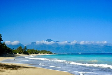 a beautiful sandy beach on the island of Maui