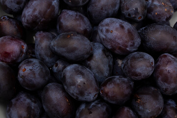 Fruit background with plum. Plums. top view. Concept of selling farm products at city street market in Tbilisi. Ingredient for compote, jam, juice. Vegetable shop. Berry store window. Vegetarian menu