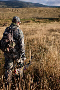 Elk hunter hiking out of the woods near Chama New Mexico.