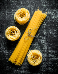 Tagliatelle and spaghetti raw.