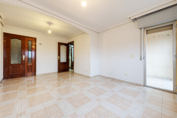 Empty living room with white walls and stoneware floor with a corner terrace and sapele wood double...