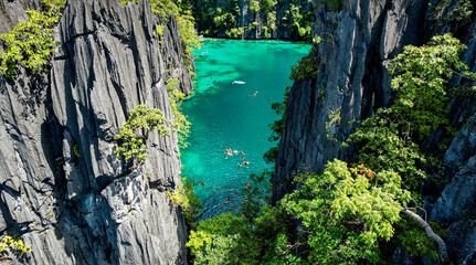 Aerial Drone Image of Swimmers In Twin Lagoon, Coron, Palawan, Philippines