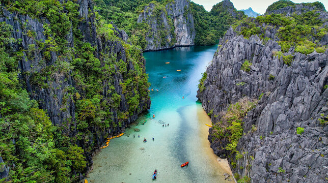 The Big Lagoon In El Nido, Palawan, Philippines. Kayaking In Shallow Channel. Crystal Clear Water, Turquoise Colored Reef 