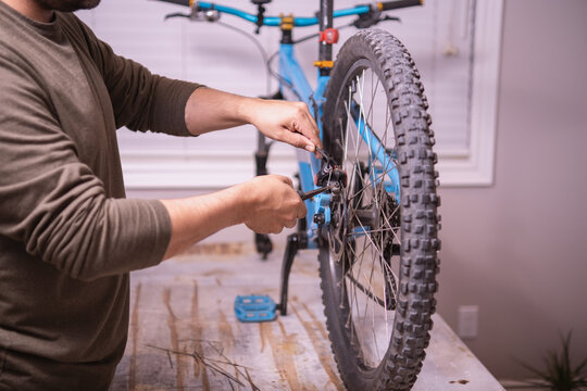 Man fixing a rear break