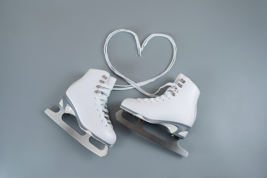 Ice skates shoes on gray background