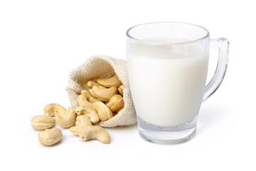 Cashew milk and cashew nuts isolated on white background.