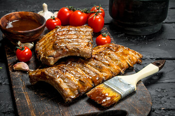 Grilled ribs with sauce.