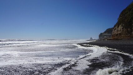 THE SEA, THE WAVES, THE BLUE SKY AND THE SAND