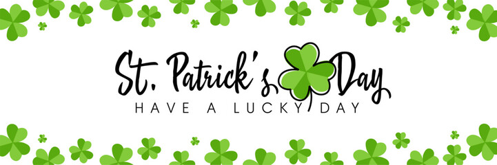 Greeting card for Happy St. Patrick's Day with green clover on white background © Pixel-Shot